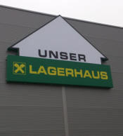 Lagerhaus, Lagerhaus Zwettl, Leuchtkasten, Leuchtkästen, Leuchtreklame, Lichtwerbung, Leuchtwand, Fassandenleuchte, Dekupierter Kasten, LED Leuchtkasten, Werbekasten, Plexikasten, Nasenschild, Leuchtende Werbung, Reklame, Reklamewand, Leuchtreklame, Metal